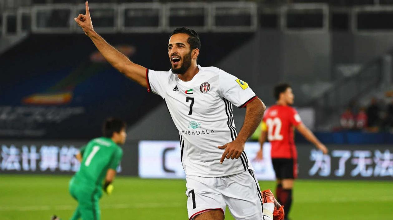 Ali Mabkhout celebra el gol del triunfo. 