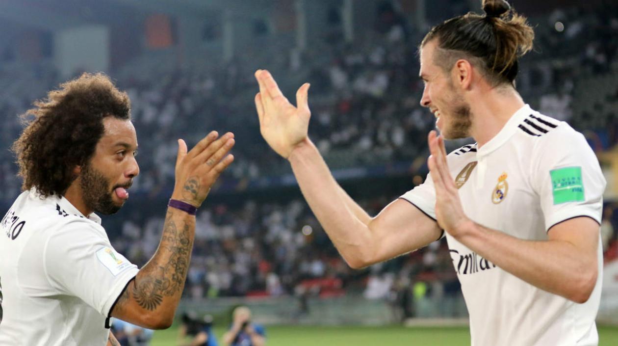 Marcelo y Gareth Bale celebran tras una anotación. 