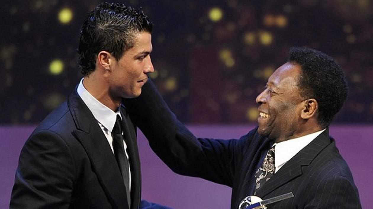 Cristiano, en una foto de 2014, con Pelé.