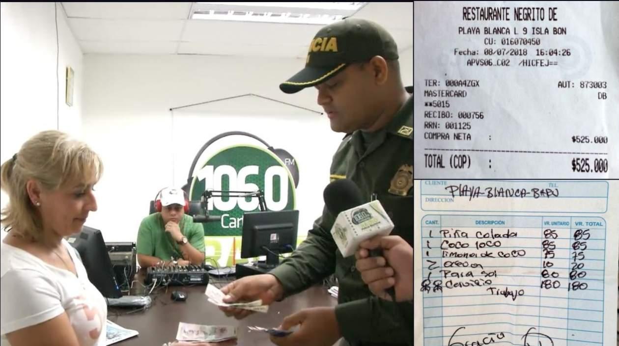 Un policía devuelve el dinero cobrado de más por un restaurante en Cartagena.