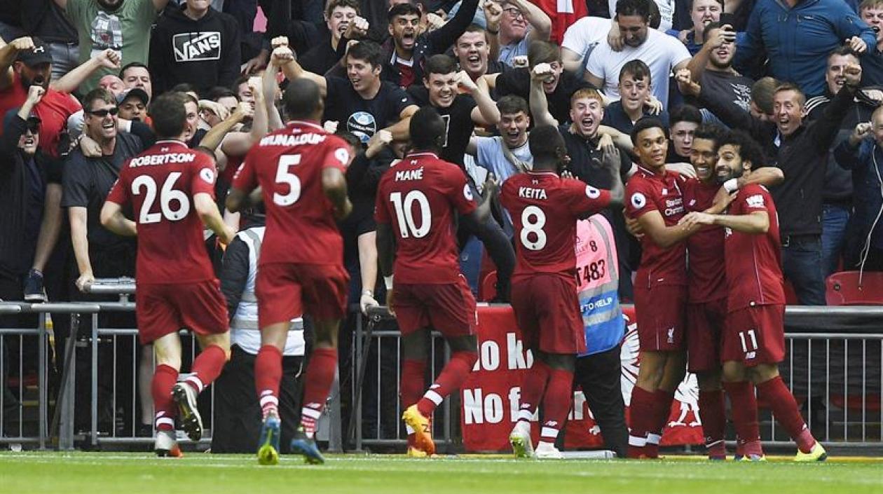 Jugadores del Liverpool celebrando el gol de Firmino. 
