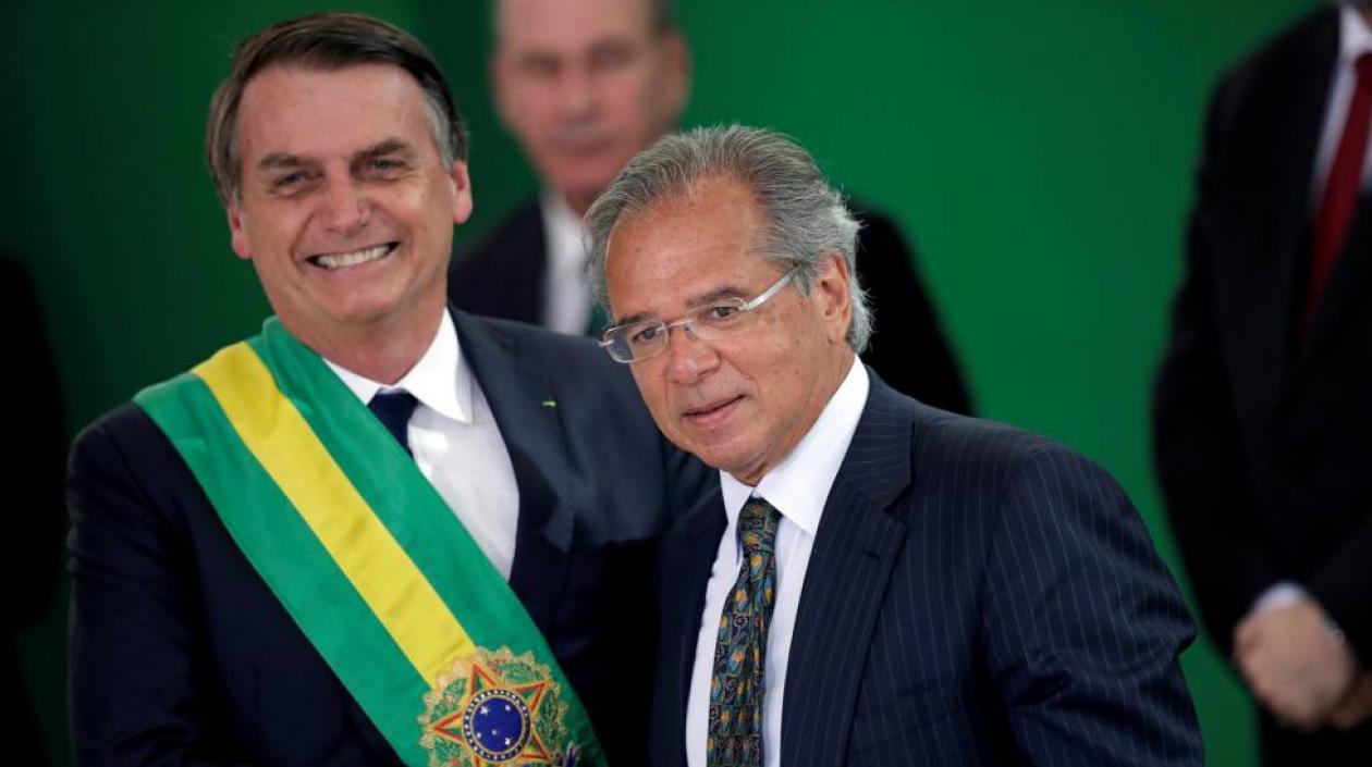El presidente de Brasil, Jair Bolsonaro, y el ministro de Economía, Paulo Guedes.
