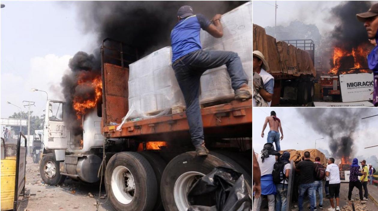 Vista general de uno de los camiones con cargamentos de la ayuda humanitaria que fueron quemados, este sábado, en Ureña (Venezuela).