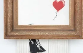 Estado en que quedó la obra  "Niña con globo" de Banksy.