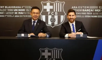 El presidente del FC Barcelona, Josep Maria Bartomeu y Lionel Messi.