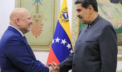 El fiscal de la Corte Penal Internacional (CPI), Karim Khan, y el Presidente Nicolás Maduro