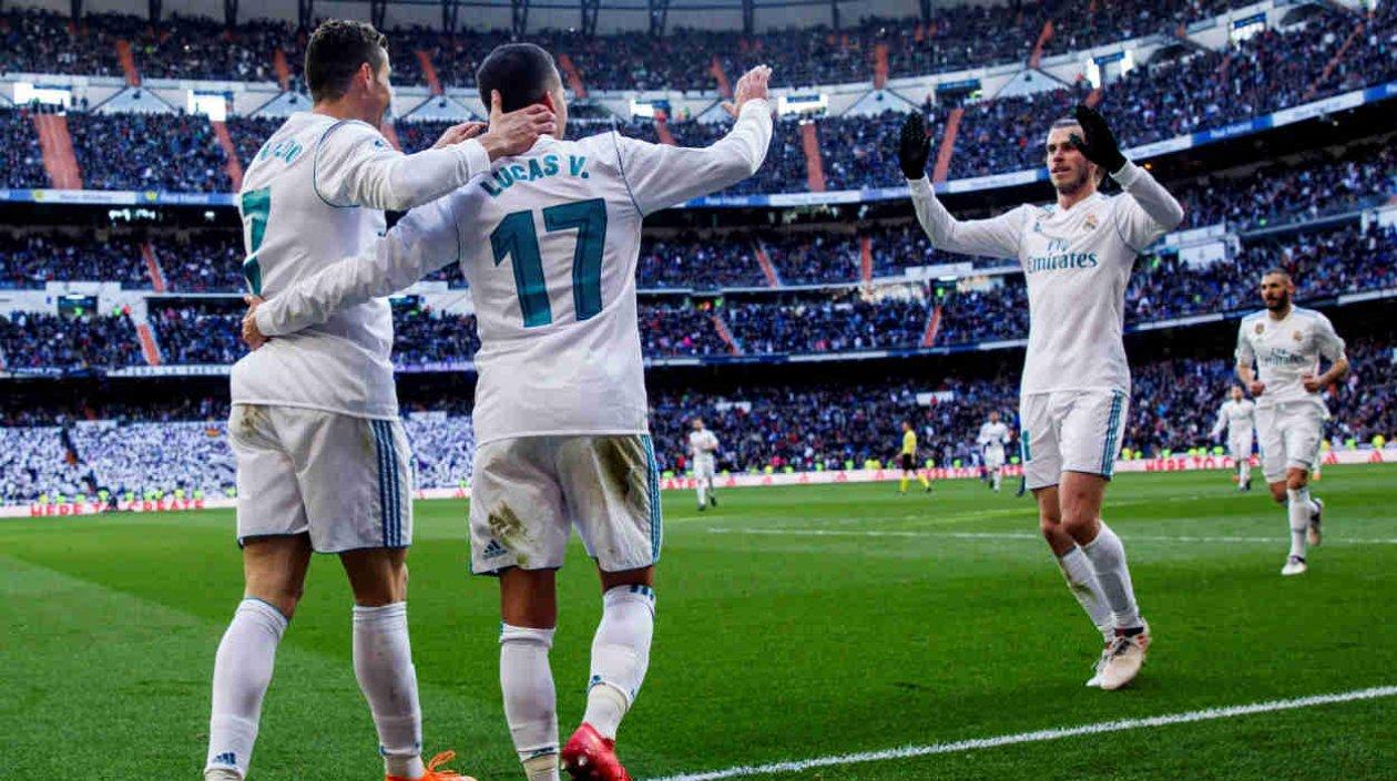 El delantero portugués del Real Madrid Cristiano Ronaldo (i), el centrocampista Lucas Vázquez (c) y el delantero Galés Gareth Bale (d), festeja un gol.