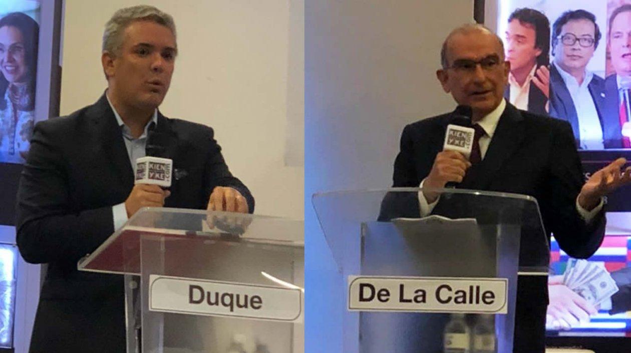 Iván Duque y Humberto De la Calle, interviniendo en el evento.
