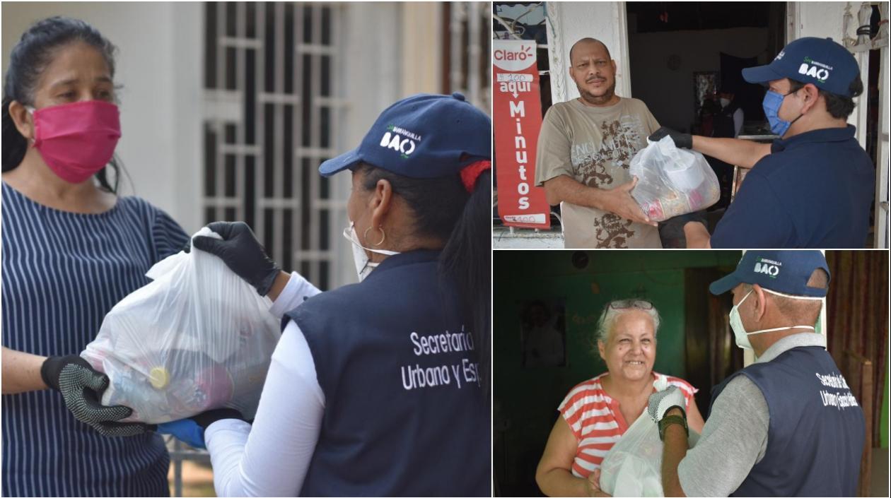 Vendedores recibiendo el auxilio de la Alcaldía de Barranquilla.
