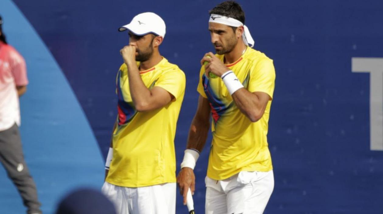Juan Sebastián Cabal y Robert Farah, tenistas colombianos principales en la Copa Davis.