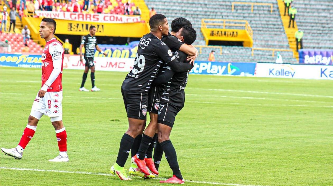 Jugadores del Junior celebrando el gol de Fabián Sambueza en 'El Campín'.
