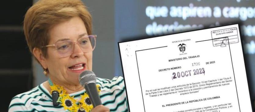 La ministra de Trabajo, Gloria Ramírez, enseña el decreto 1736 del 20 de octubre