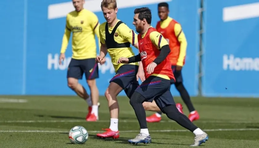 Frenkie De Jong y Lionel Messi, en un entrenamiento.