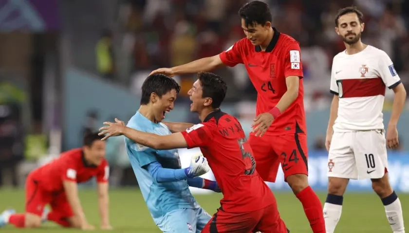 Los jugadores surcoreanos festejan la clasificación tras vencer a Portugal. 