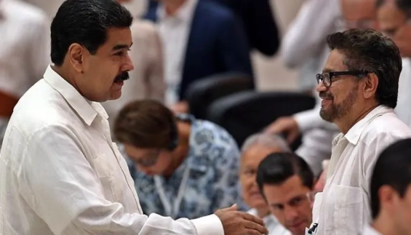 Iván Márquez y Nicolás Maduro.