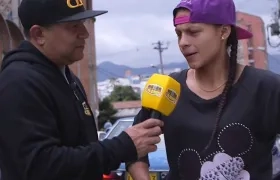Dayana Cordero, boxeadora colombiana, con el periodista Marco Pérez. 