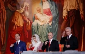 Vladimir Putin en un acto en una iglesia ortodoxa.