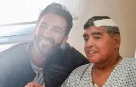 Leopoldo Luque con Diego Armando Maradona.