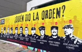 Mural con las caras de militares implicados en falsos positivos.
