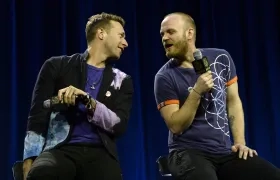 El vocalista de Coldplay Chris Martin y su guitarrista Jonny Buckland.