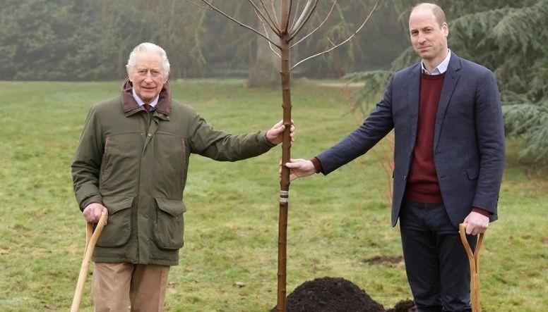 Carlos II y el príncipe Guillermo en una jornada de siembra de árboles