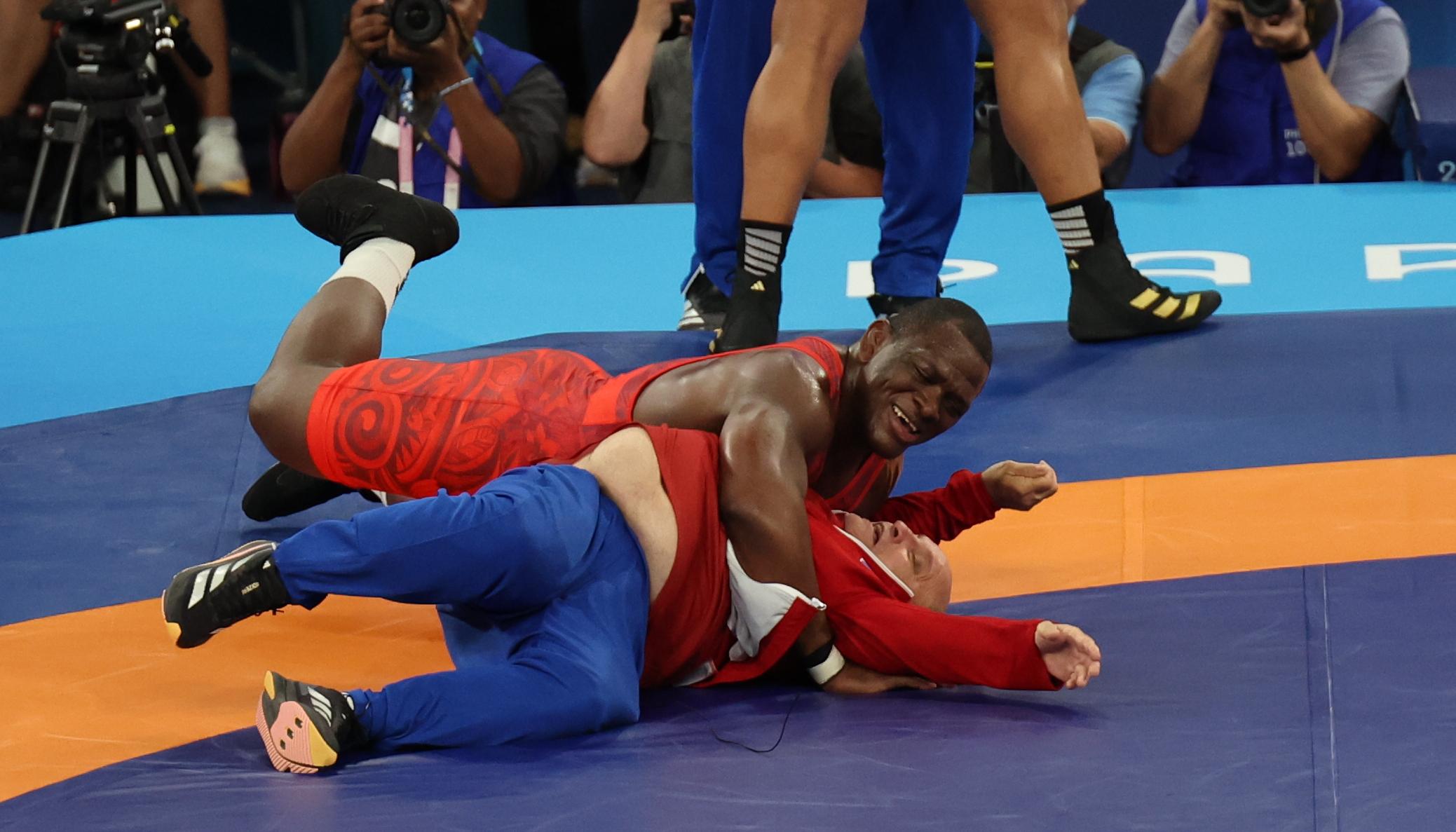 Mijaín López durante su combate contra el chileno Yasmani Acosta. 