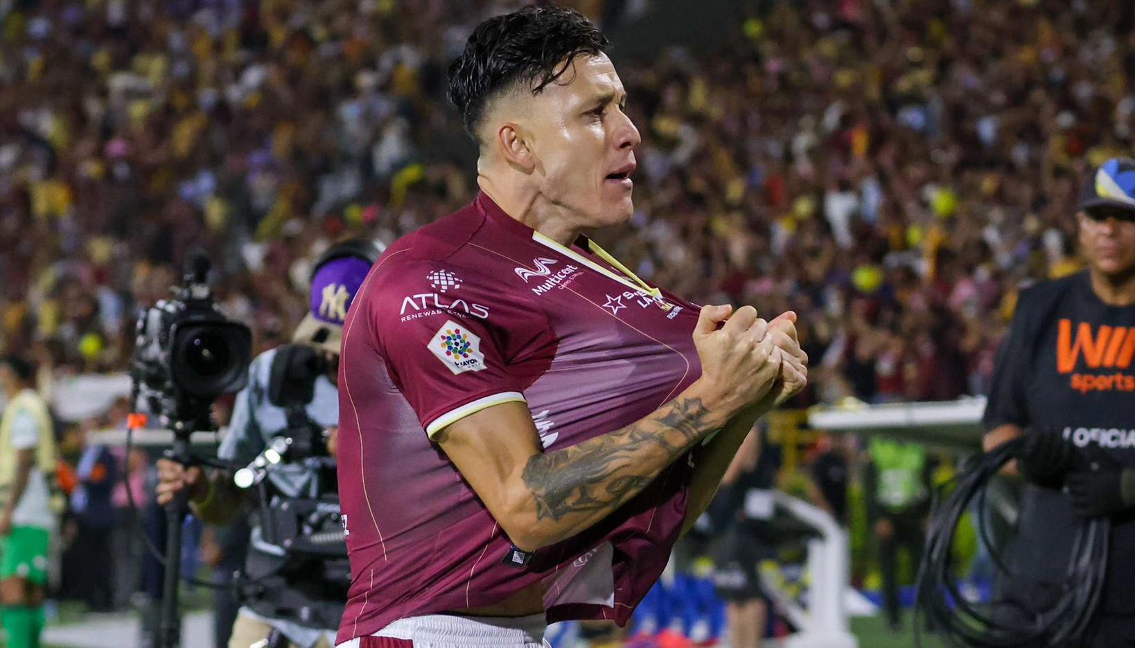 El paraguayo Gustavo Adrián Ramírez celebra el gol del empate del Tolima. 