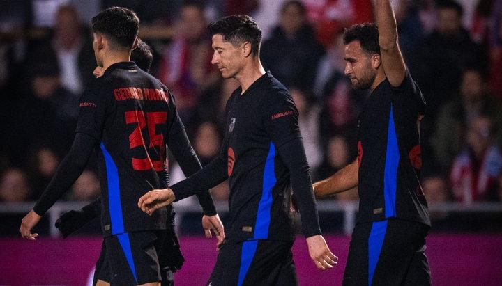 Jugadores del Barcelona tras un gol de Lewandowski.