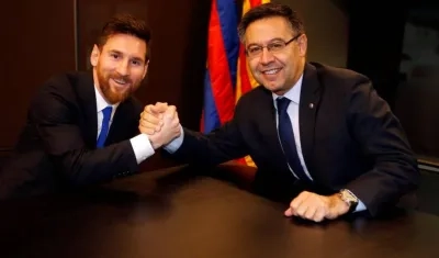 Lionel Messi y Josep Maria Bartomeu.