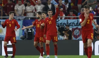 Ferrán Torres (11) celebra uno de los goles de España. 