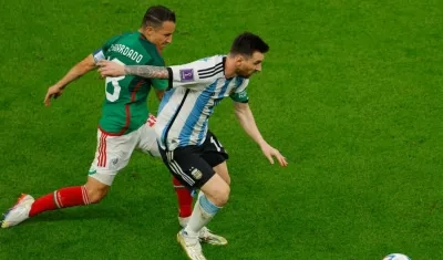 Andrés Guardado y Lionel Messi.