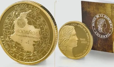 La moneda conmemorativa.