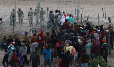 Migrantes llegando a la frontera entre México y Estados Unidos. 